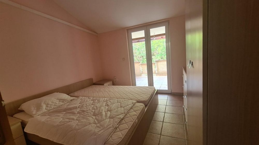 Schlafbereich mit Zugang zum Balkon