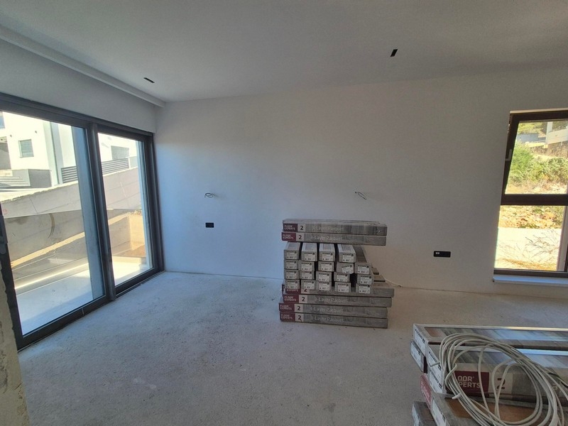 Wohnbereich im Rohbau-Zustand.