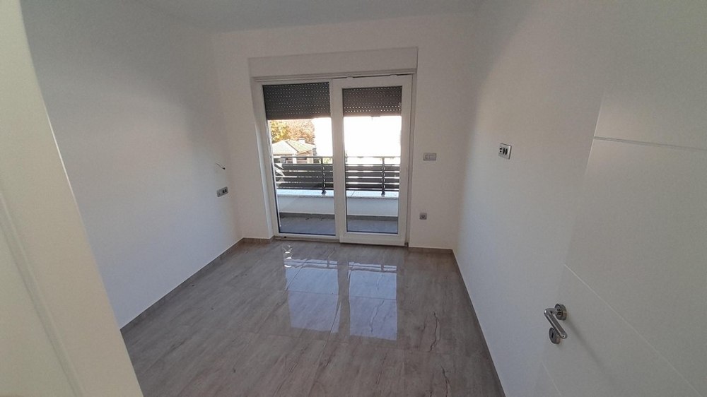 Schlafzimmer mit Balkonzugang