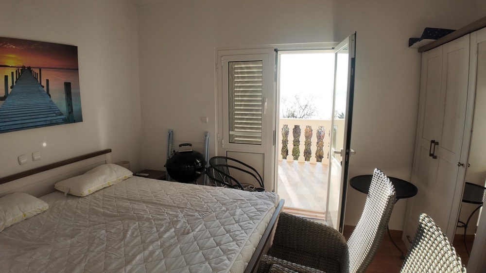 Schlafzimmer mit Balkonzugang