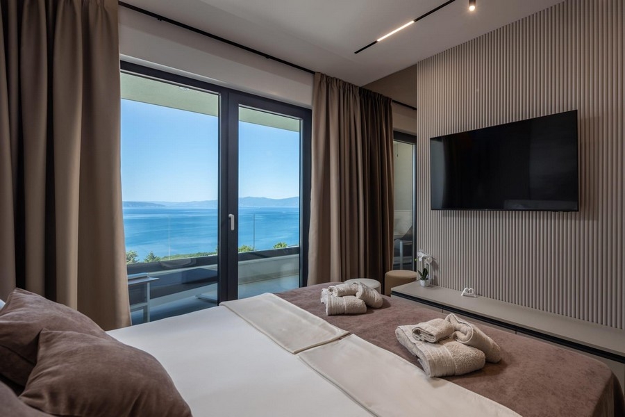 Schlafzimmer mit Panoramablick auf das Meer