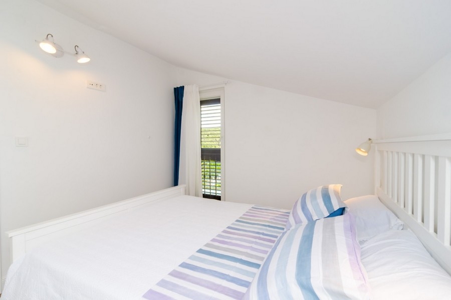 Schlafzimmer mit Balkonzugang