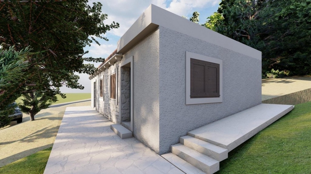 Hausansicht mit Garten und Zufahrt in naturnaher Umgebung