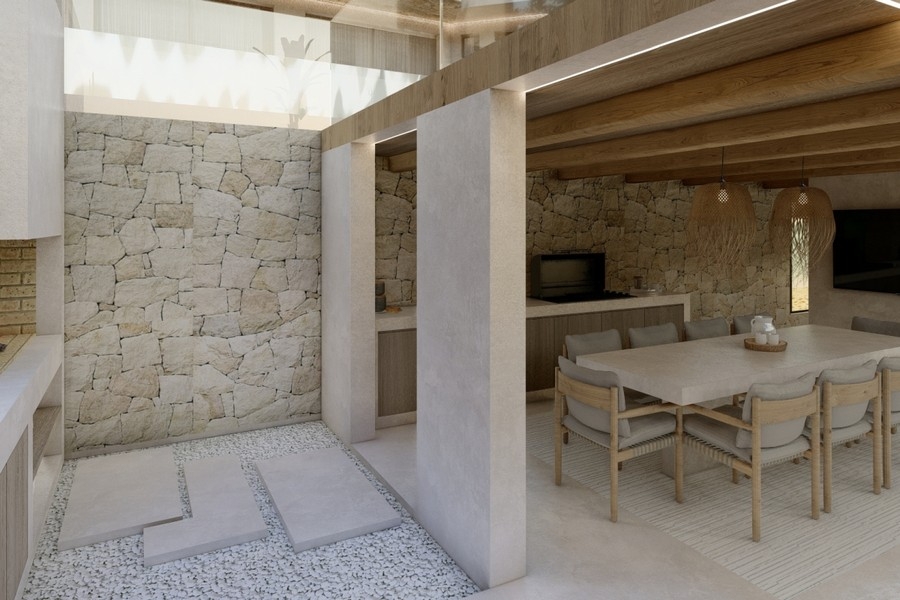 Mediterraner Außenbereich mit Naturstein und Loungezone