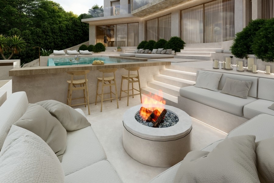 Outdoor-Lounge mit Feuerstelle und Poolbereich einer Luxusvilla