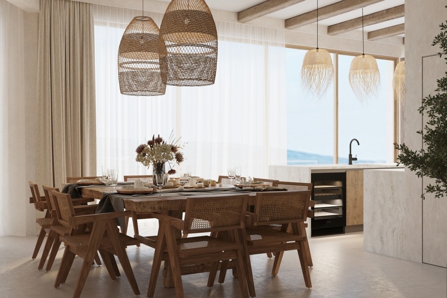 Offener Wohn- und Essbereich mit Meerblick und Naturmaterialien