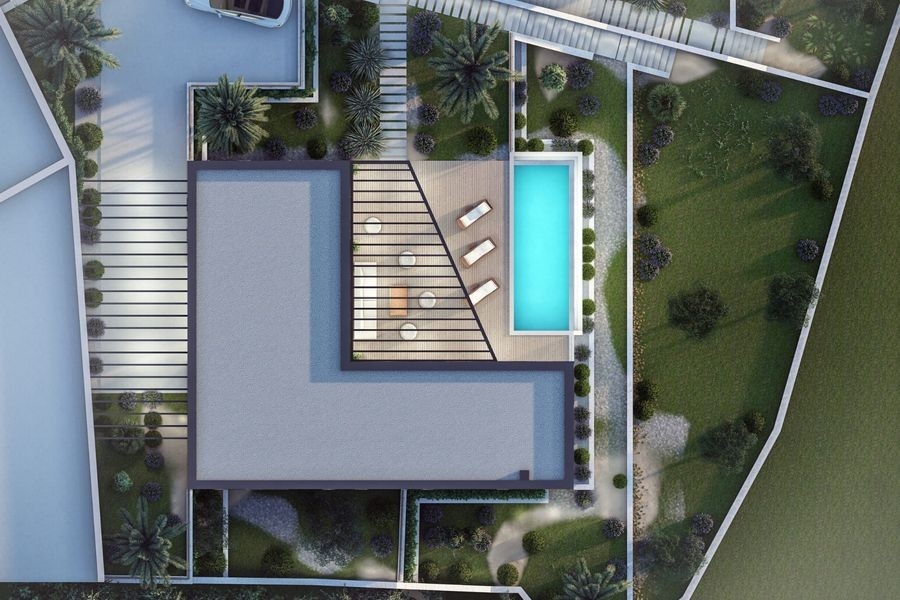 Außenansicht der Villa mit großen Fensterfronten