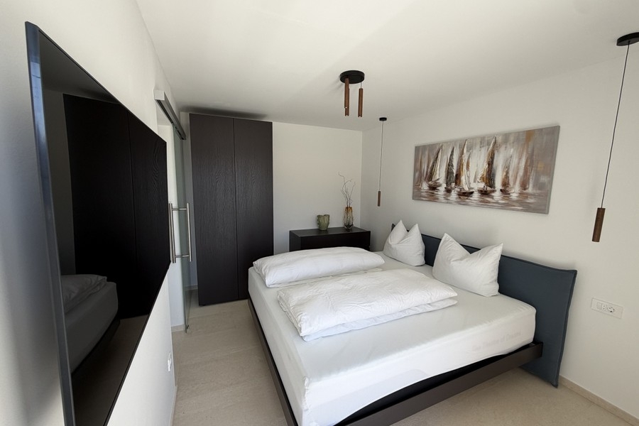 Schlafzimmer mit Doppelbett