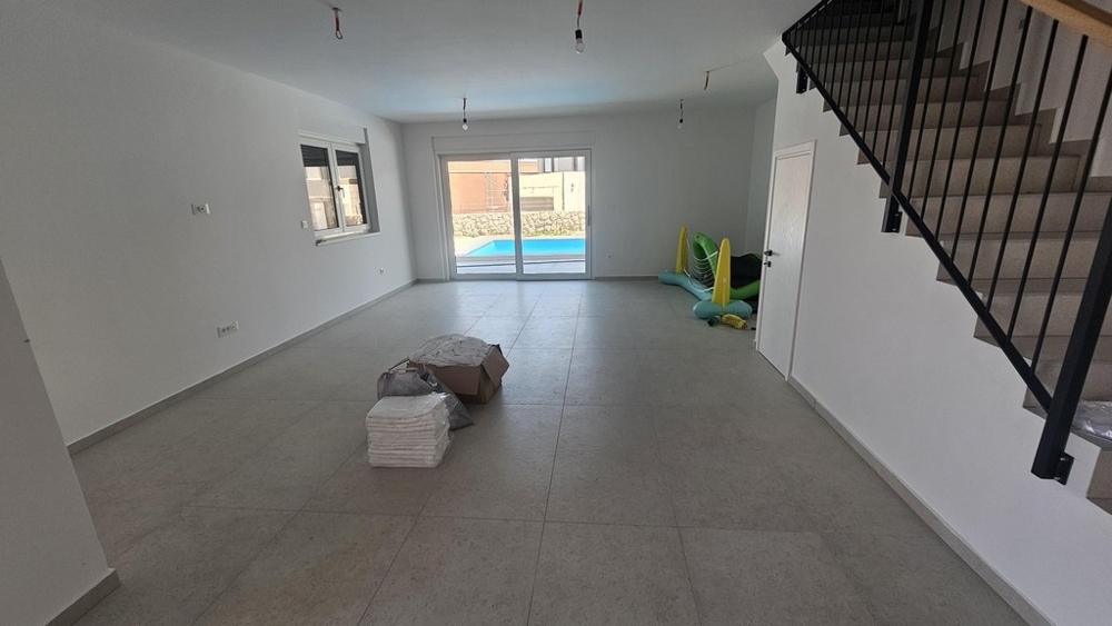 Wohnbereich mit Zugang zur Terrasse