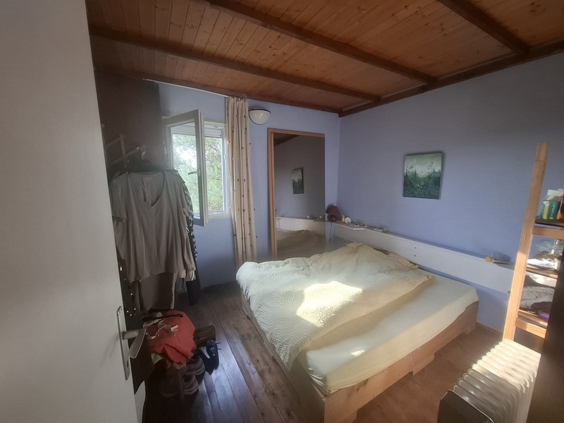 Schlafzimmer mit Holzdecke im Haus auf der Insel Solta