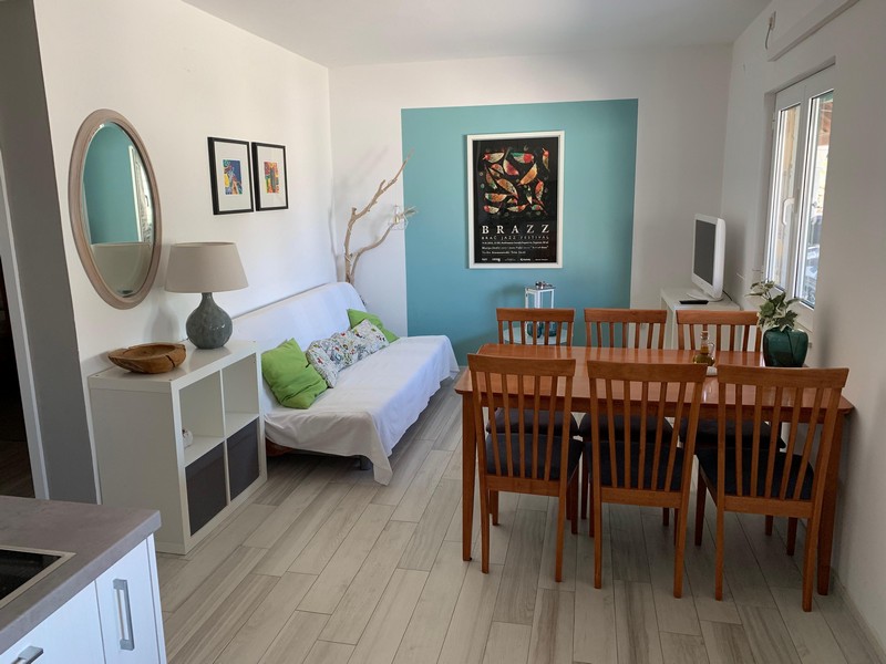 Wohnbereich mit Essbereich in einem der Apartments, Haus H4090 Povlja