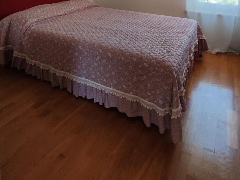 Schlafzimmer mit Holzboden