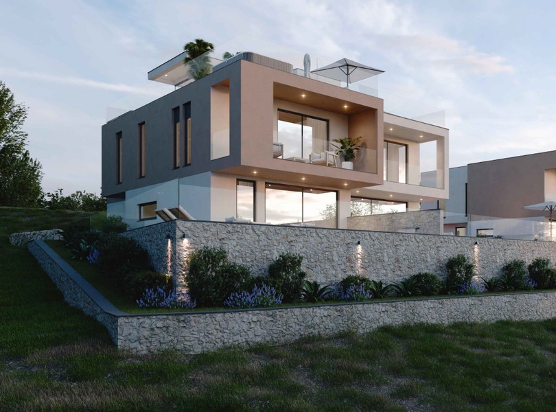Seitenansicht des Hauses über der Natursteinmauer