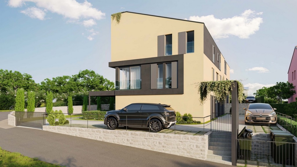 Seitenansicht eines stilvollen, zweistöckigen Appartementgebäudes mit ockergelber Fassade und großer Glasfront, gelegen in einem ruhigen Wohngebiet – Immobilien Kroatien, Appartement kaufen Insel Krk.