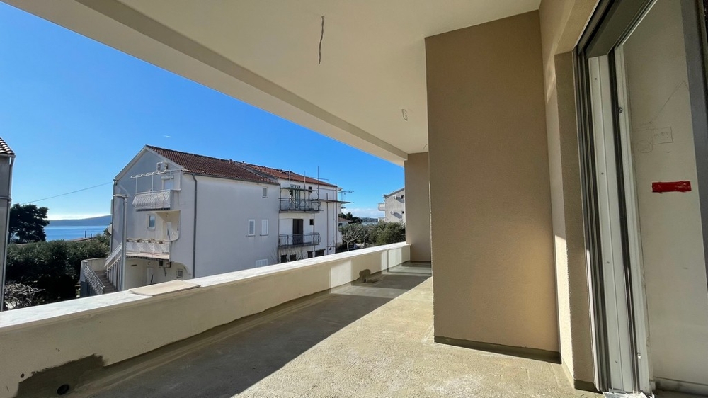 Überdachte Terrasse mit Meerblick