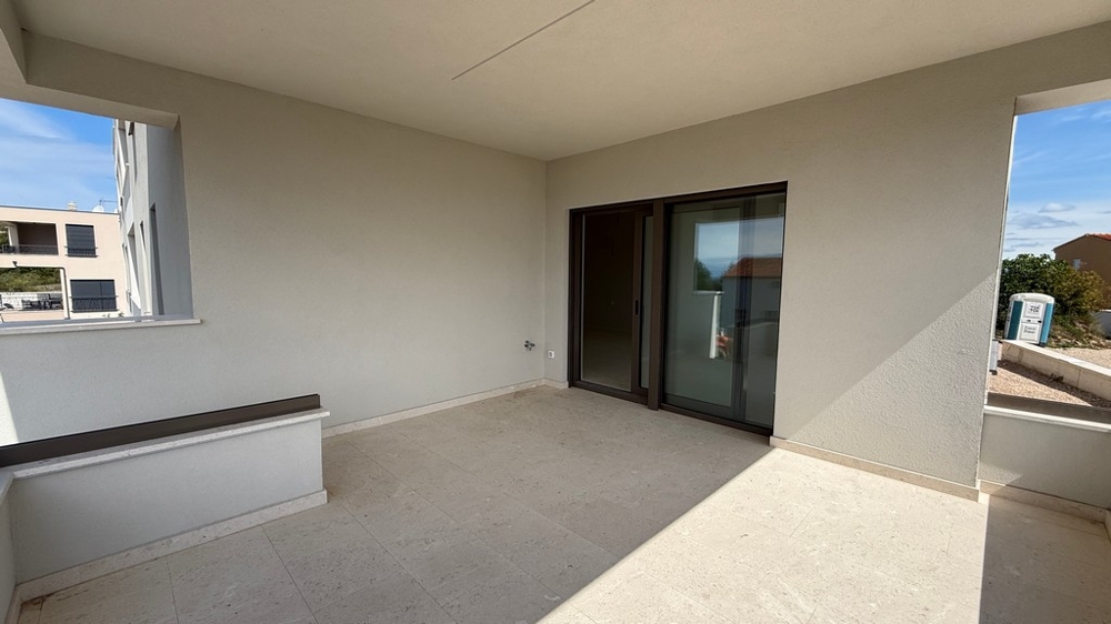 Überdachte Terrasse mit Zugang zum Wohnbereich