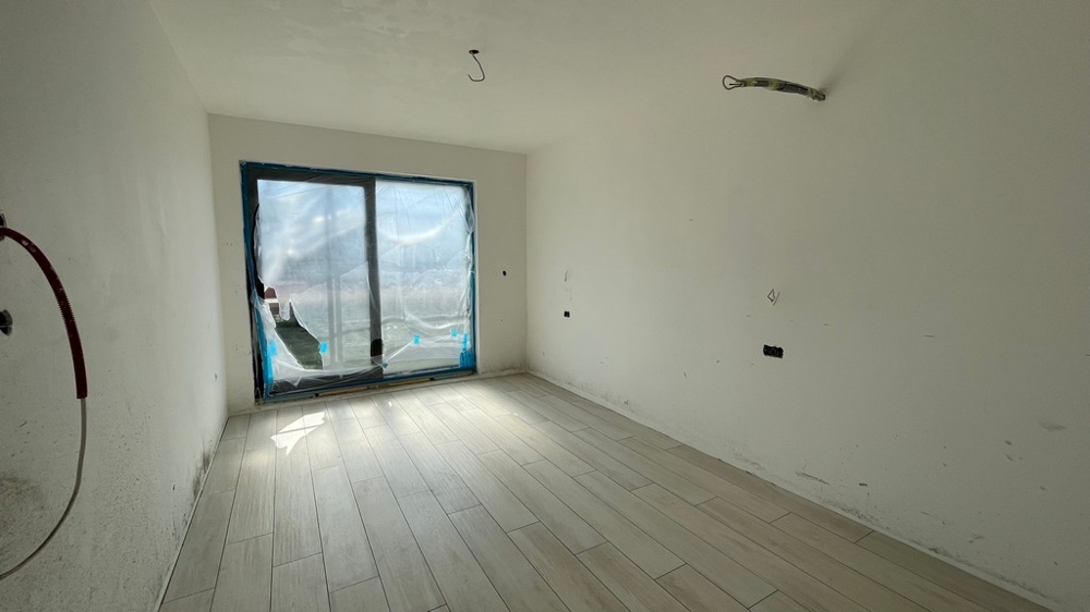 Weiteres Schlafzimmer mit großzügiger Fensterfront