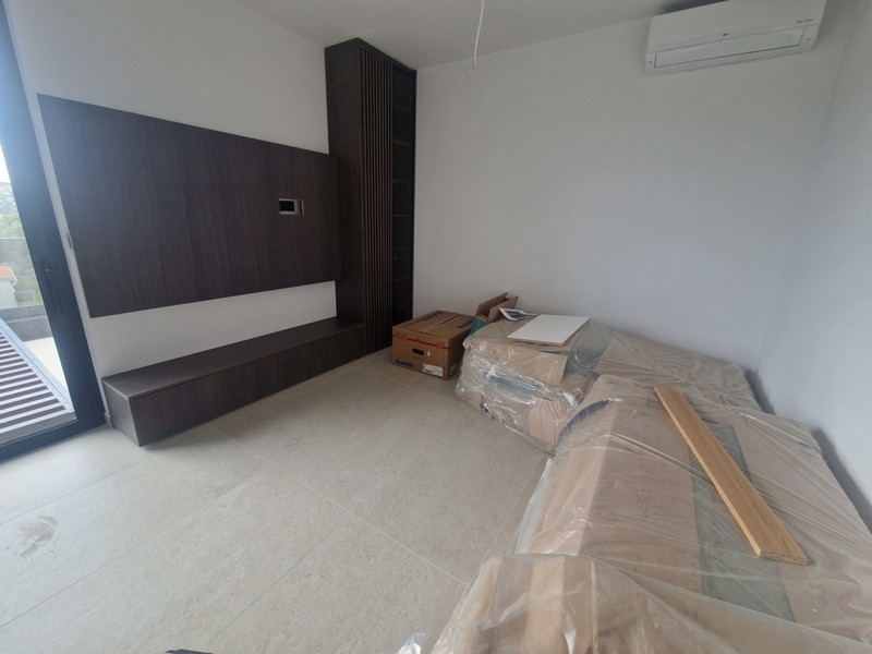 Schlafzimmer mit Zugang zur Terrasse