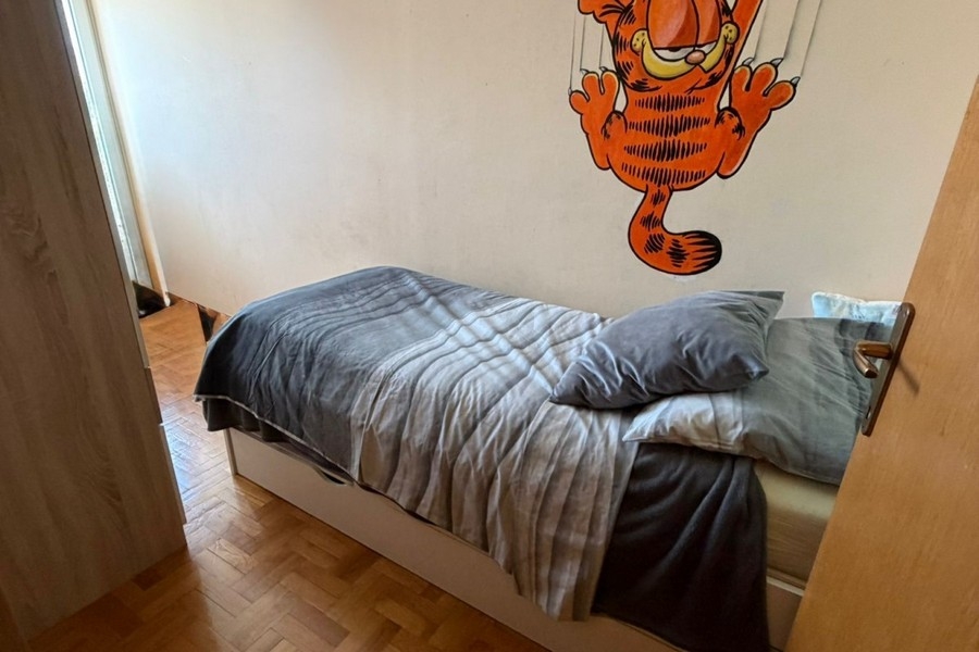 Zweites Schlafzimmer mit Einzelbett