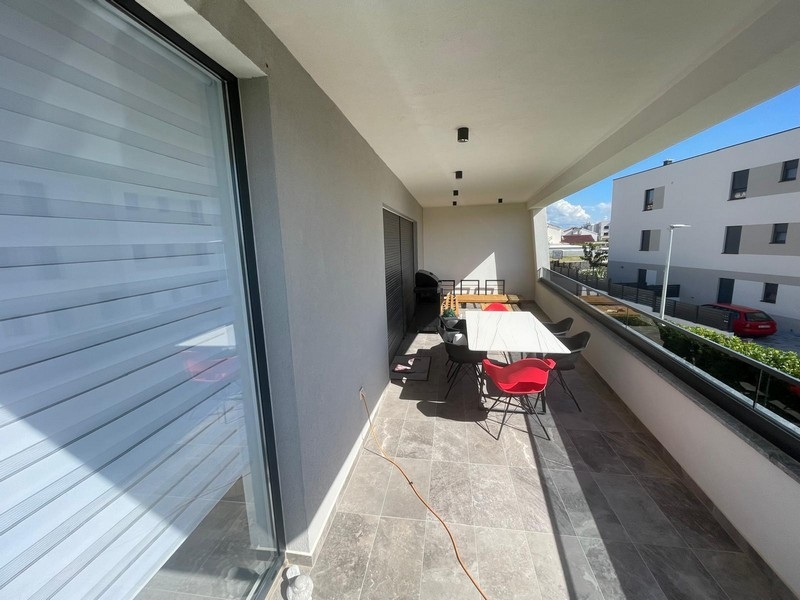 Überdachte Terrasse mit Sitzbereich