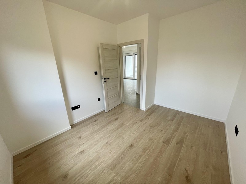 Zweites Schlafzimmer mit Holzboden