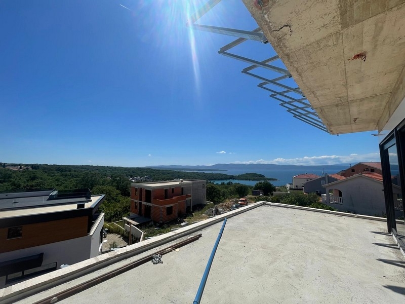 Dachterrasse des Penthouses mit Pergola und Meerblick