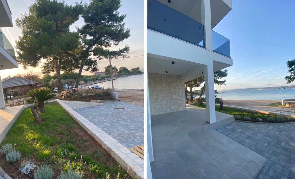 Rasenfläche vor der Villa mit Blick zum Meer