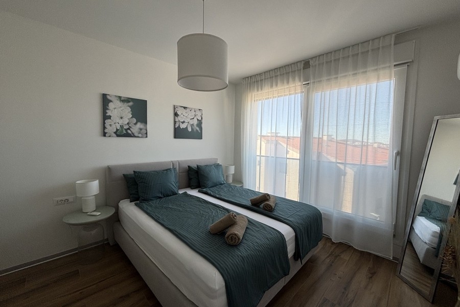 Schlafzimmer mit Doppelbett im Penthouse in Trogir auf Ciovo