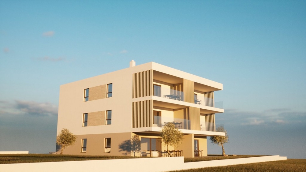 Seitenansicht des Neubaus mit Terrassen und Glasgeländern