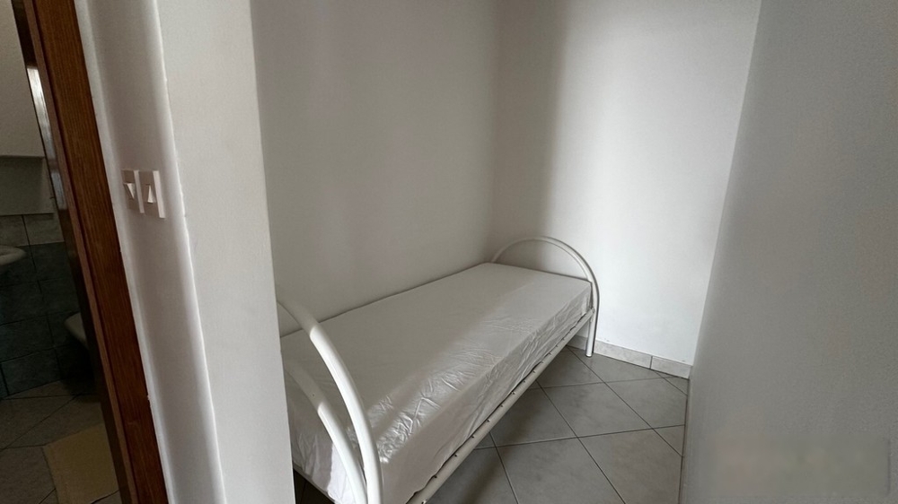 Zweites Schlafzimmer mit Einzelbett