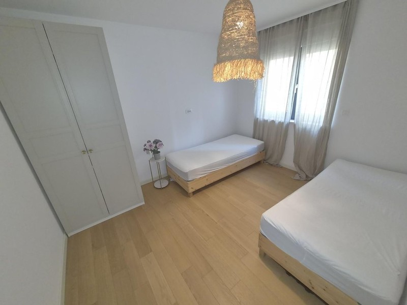 Zweites Schlafzimmer mit zwei Einzelbetten