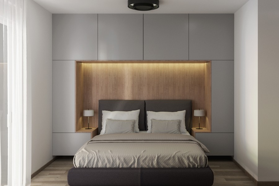 Einbauschrank und Holzverkleidung hinter dem Bett