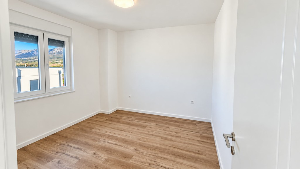 Schlafzimmer mit Holzboden