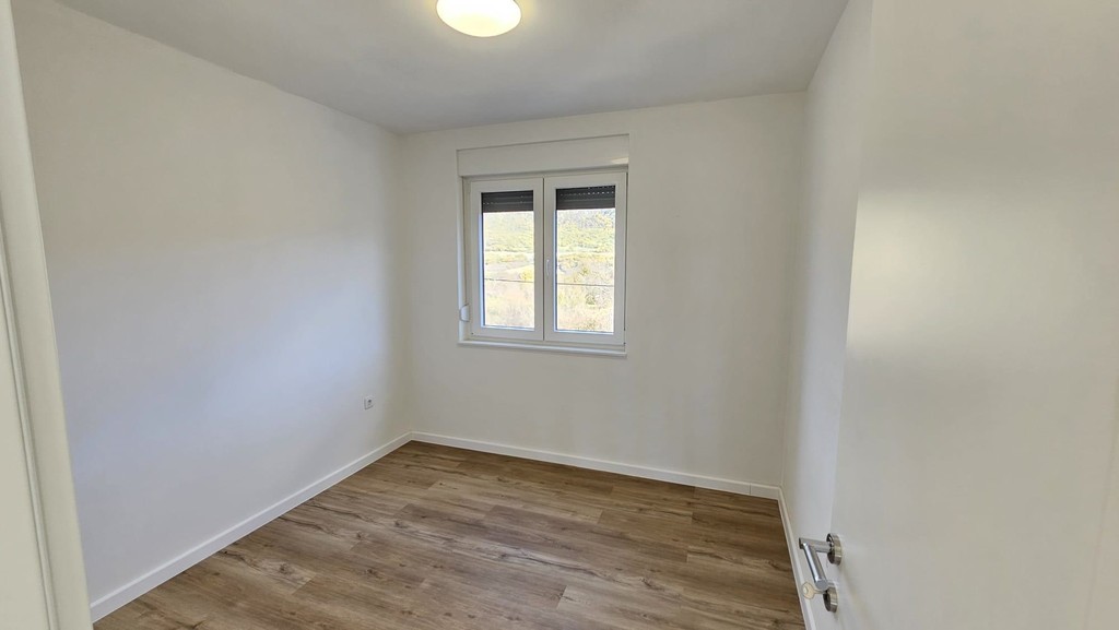 Schlafzimmer mit Laminatboden