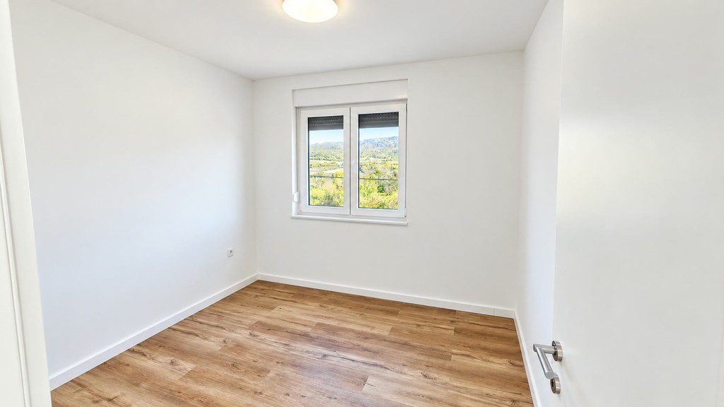 Schlafzimmer mit Holzboden