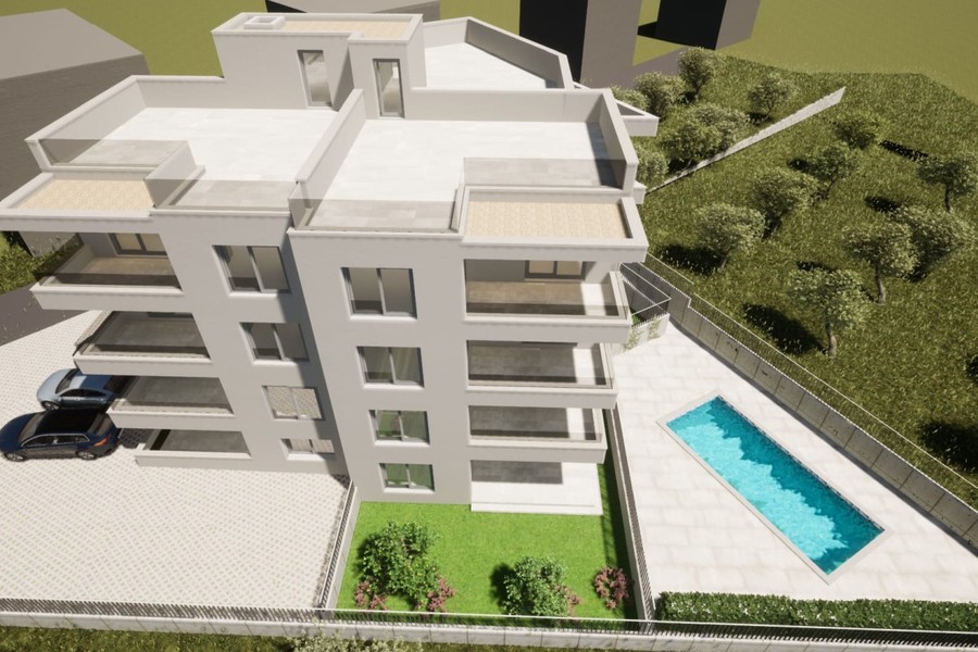Neubau von oben mit Dachterrassen