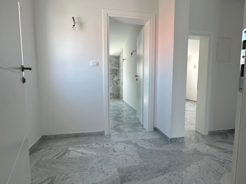 Flur mit Zugang zu Bad und Schlafzimmer